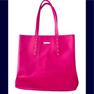 NWOT. Juicy Couture pink leather tote.Gold details.Logo has protective wrap16x15